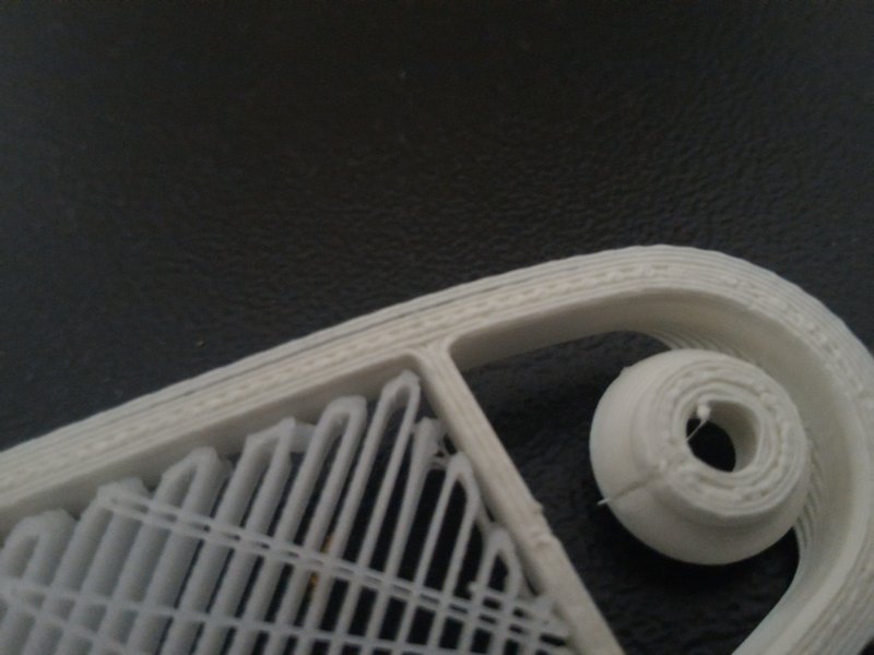 Brim outside (left on picture), not inside (right on picture)